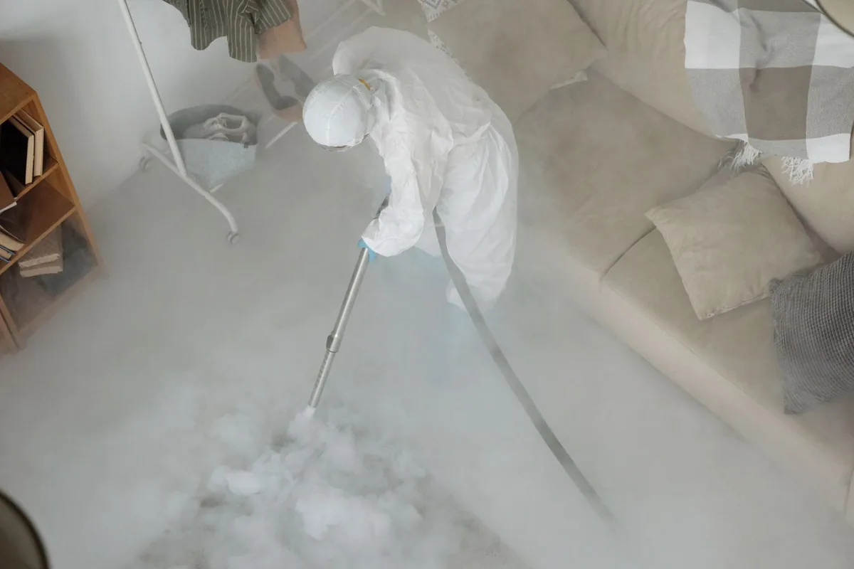 Biohazard cleanup technician in protective equipment, Gold Hill, OR